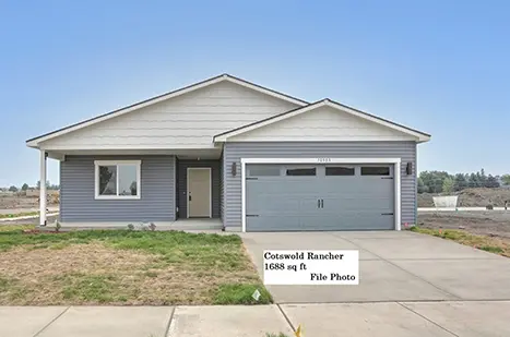 A house with a blue door and white trim.